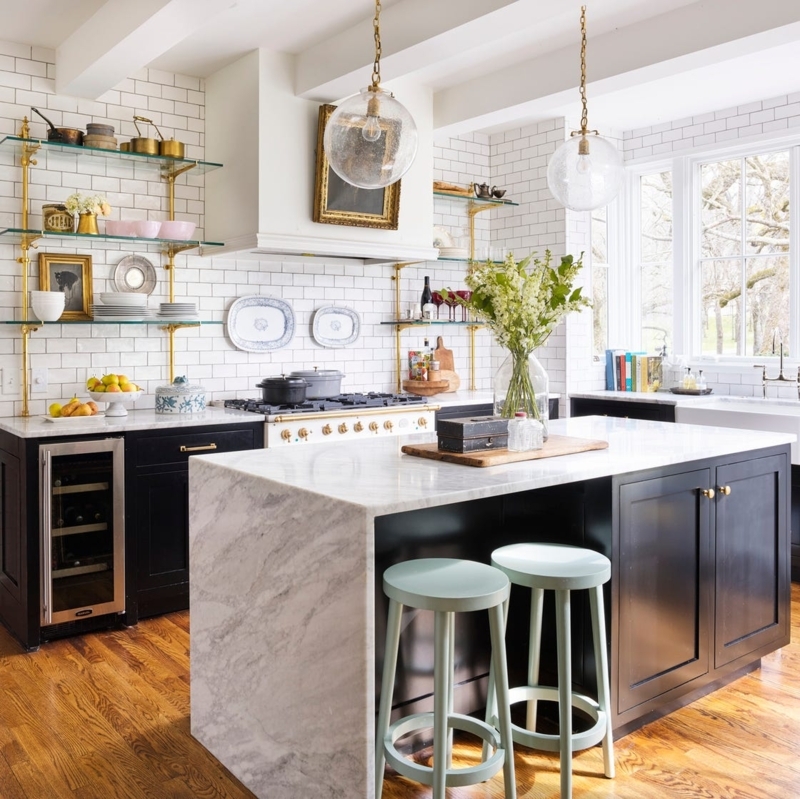 Marble Waterfall Kitchen Island with Mint Green Stools and Brass Shelving