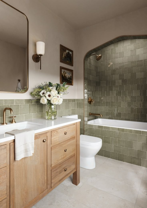 Master Bath with Sage Green Tiles and Arched Shower Alcove