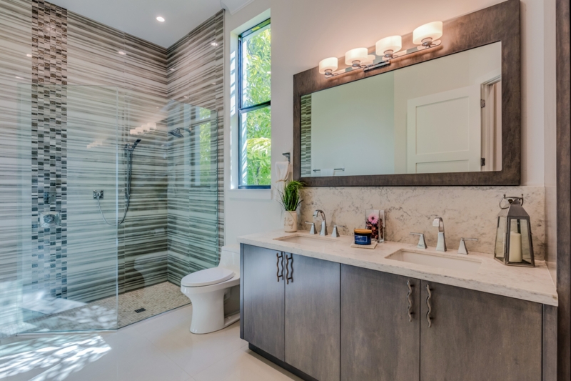Master Bathroom with Striped Tile Walk-in Shower and Double Vanity