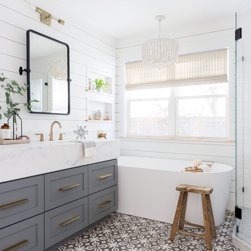 Master Bathroom with White Shiplap Walls and Patterned Tile Floor