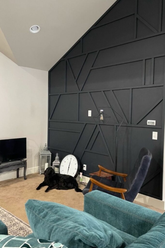 Matte Black Geometric Wood Accent Wall in Vaulted Living Room