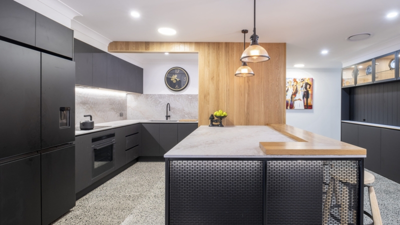 Matte Black Kitchen Cabinetry: Industrial Island with Mesh Base