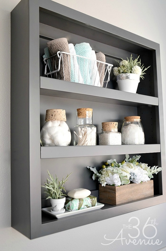 Matte Gray Three-Tier Wall Shelf Styling with Glass Jars and Cork Lids