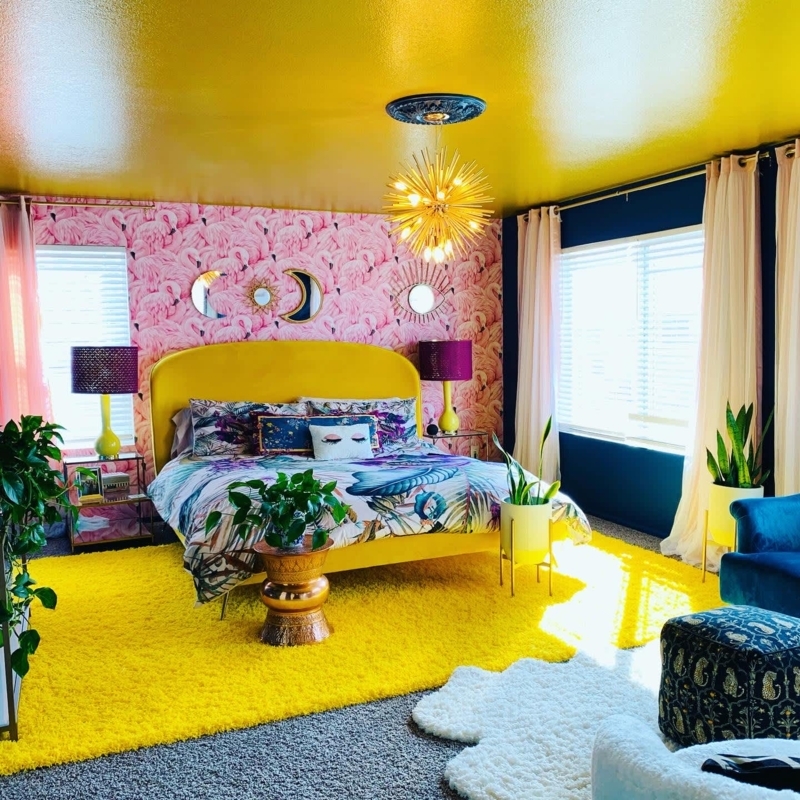 Maximalist Bedroom with Yellow Ceiling and Flamingo Wallpaper