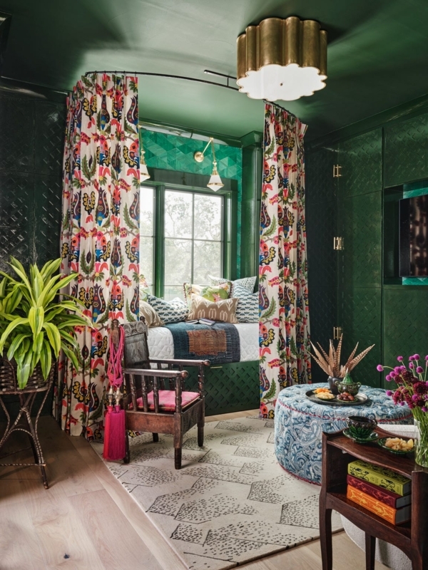 Maximalist Reading Nook with Emerald Walls and Floral Curtains