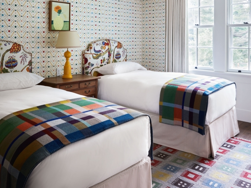 Maximalist Twin Bedroom with Lattice Wallpaper and Floral Headboards