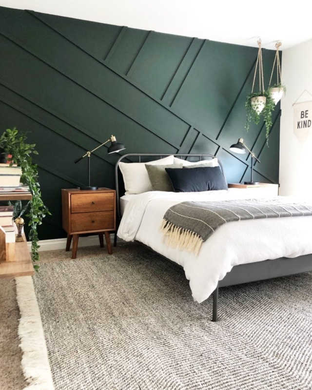 Metal Spindle Bed in Moody Bedroom with Geometric Wood Panel Wall