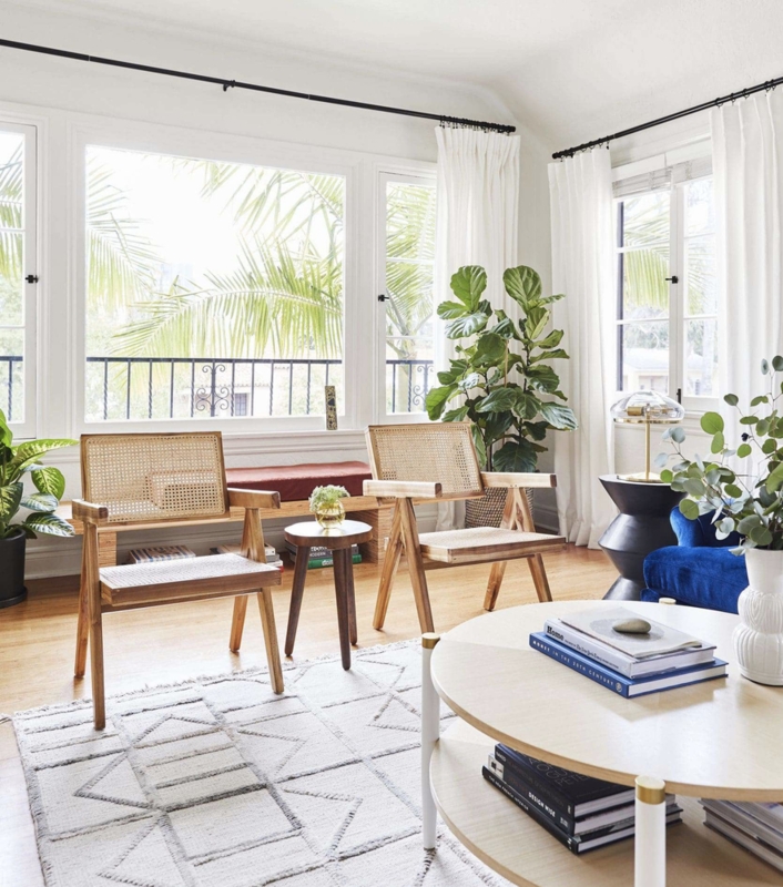 Mid-Century Cane Accent Chairs with Tapered Legs in Bright Living Room