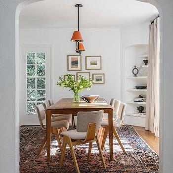 Mid-Century Dining Set framed by Arched Doorway