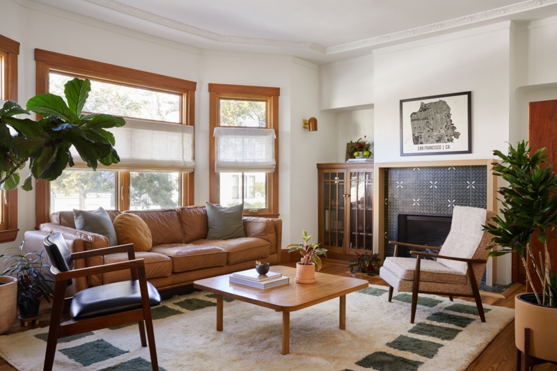 Mid-Century Modern Living Room with Tan Leather Sofa and Tiled Fireplace