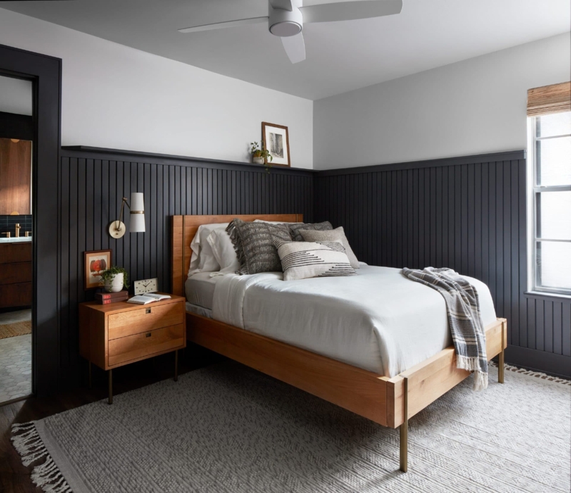 Mid-Century Modern Platform Bed against Dark Vertical Paneling