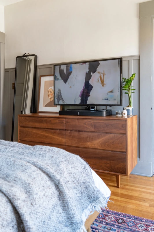 Mid-century Wood Dresser with Tapered Legs and Leaning Art