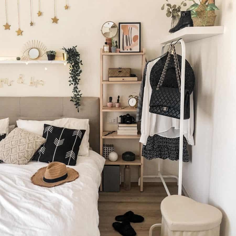Minimalist Clothing Rack and Ladder Shelf in Boho Bedroom