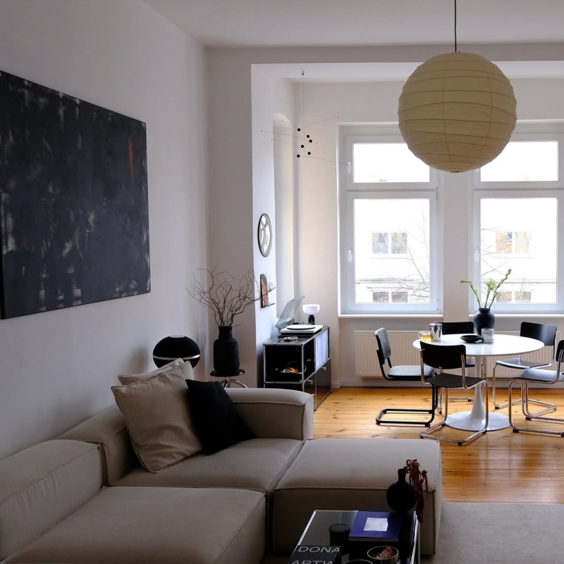 Minimalist Living Room featuring Beige Modular Sofa and Paper Lantern