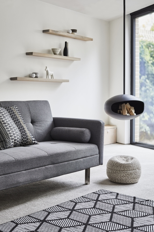 Minimalist Living Room Grey Sofa Suspended Fireplace Geometric Rug