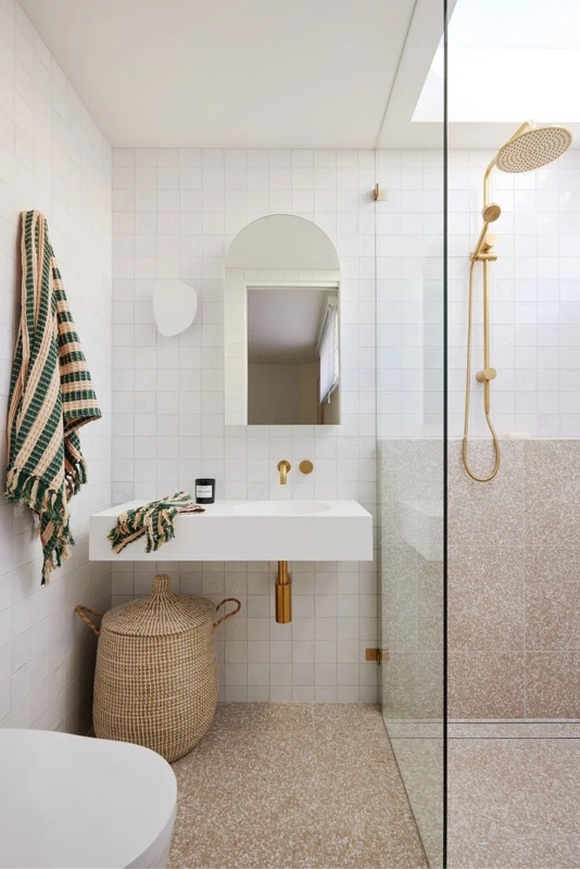 Minimalist Scandinavian Bathroom with Terrazzo Floor and Gold Fixtures