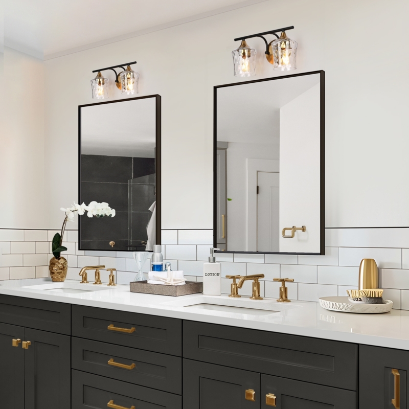 Mixed Metal Vanity Light with Hammered Glass Shades over Subway Tile
