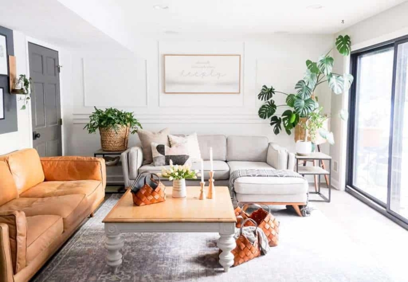Mixed Seating Textures in Bright Basement with Turned Leg Table