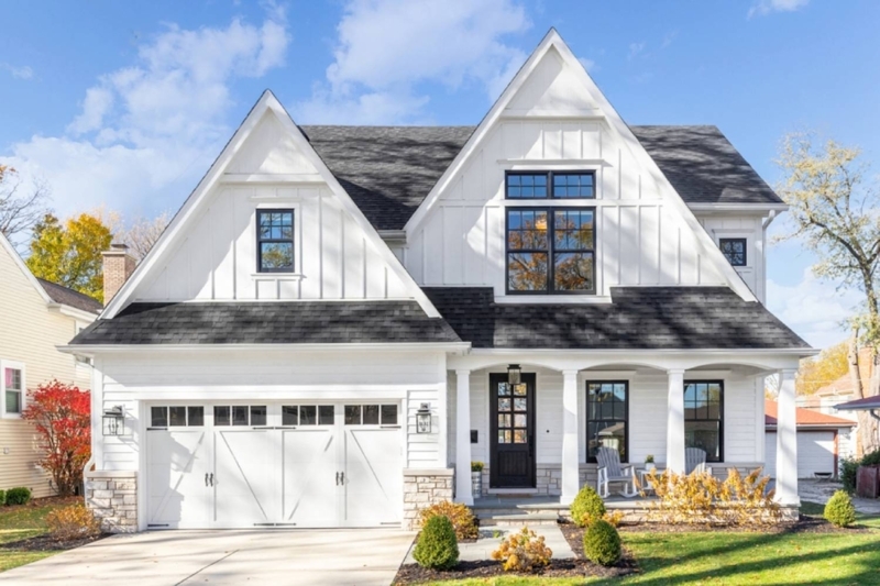 Mixed Siding Textures on Farmhouse Exterior with Stone Base