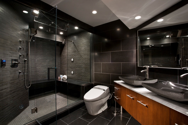 Modern Bathroom Idea with Dark Monochromatic Tiles and Wood Vanity