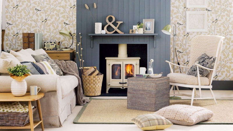 Modern Country Living Room with Slate Blue Paneling and Cream Stove
