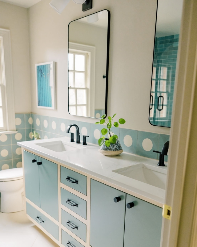 Modern Double Vanity with playful polka dot tile backsplash.