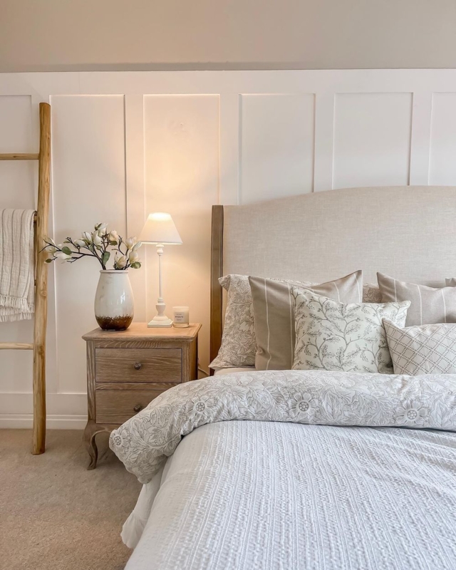 Modern Farmhouse Bedroom with Board and Batten Walls and Wood Accents