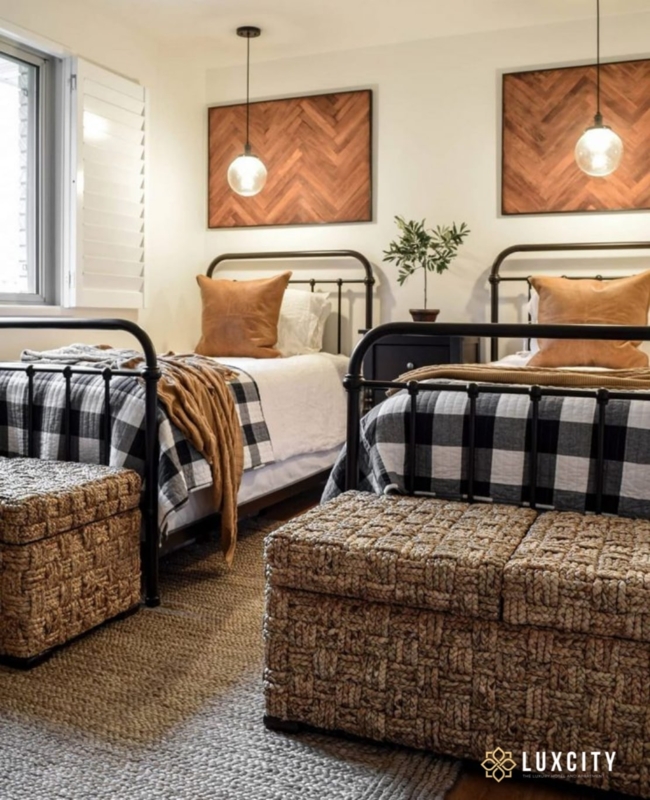 Modern Farmhouse Guest Room with Buffalo Check Bedding and Woven Trunks