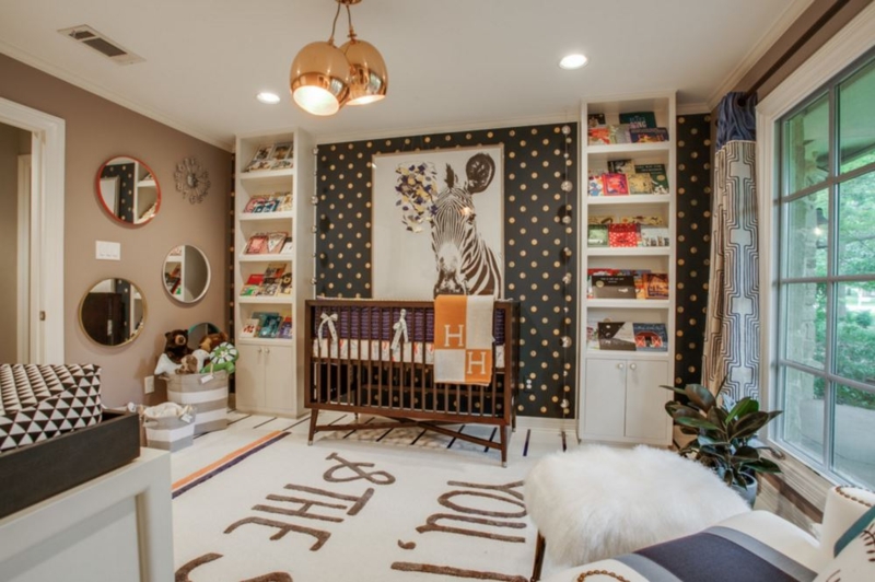 Modern Glam Nursery: Black & Gold Polka Dot Wallpaper with Dark Crib