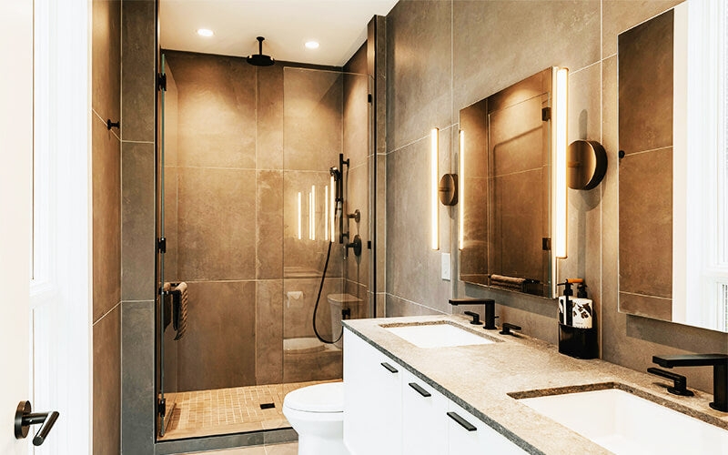 Modern Gray Stone Bathroom with Vertical Mirror Lighting