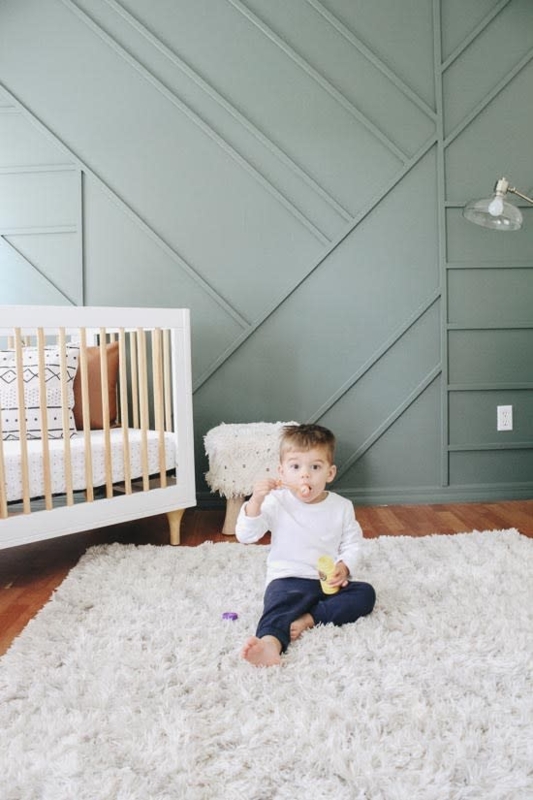Modern Nursery with Sage Diagonal Wood Slat Wall and Shag Rug
