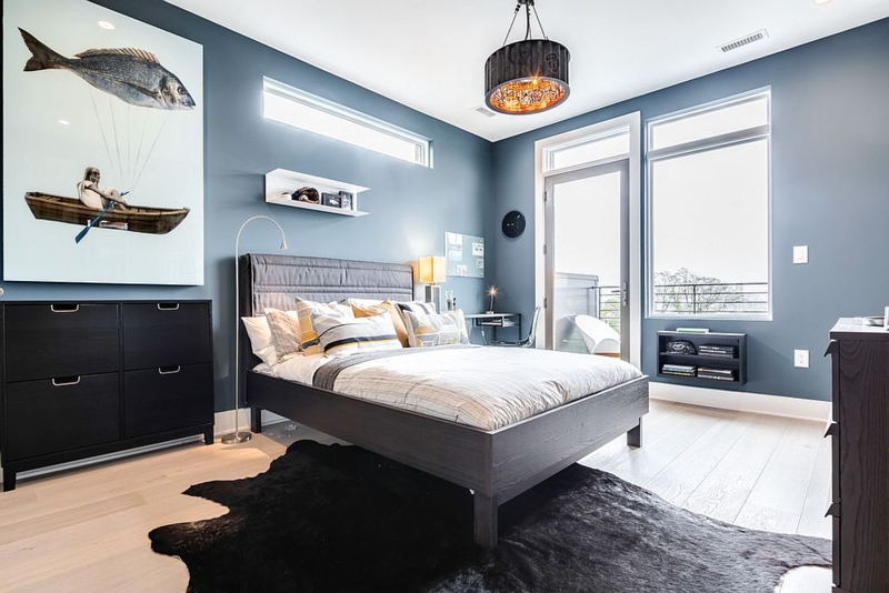 Modern Platform Bed with Oversized Wall Art & Cowhide Rug