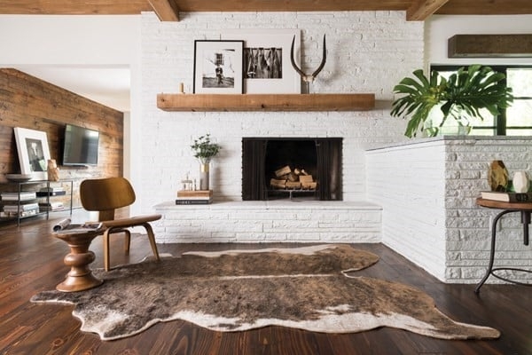 Modern Rustic Living Room with White Brick Fireplace and Cowhide Rug