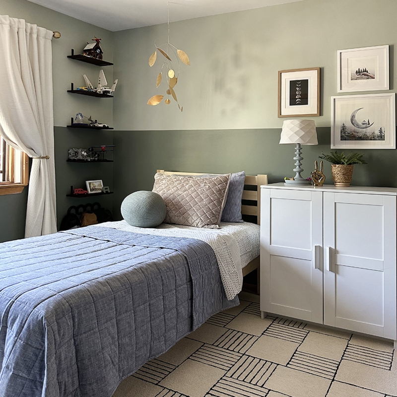 Modern Teen Bedroom with Two-Tone Green Walls and Geometric Grid Rug