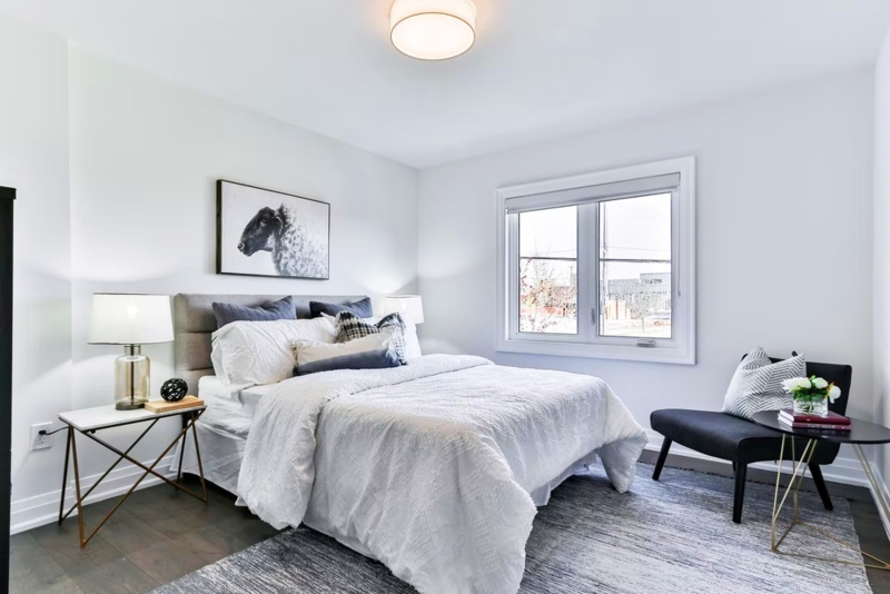 Modern Transitional Bed with Navy Accents and Textured Bedding