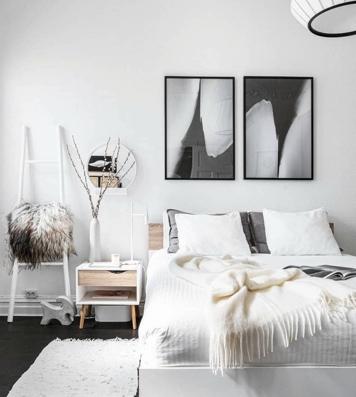 Monochrome Bedroom with Leaning Decor Ladder and Tapered Leg Nightstand