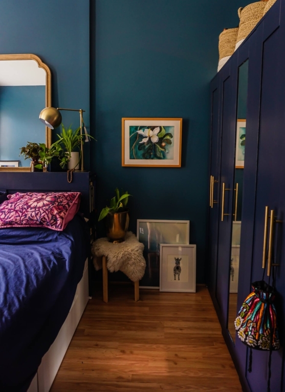Moody Bedroom Decor with Teal Fitted Wardrobes and Brass Hardware