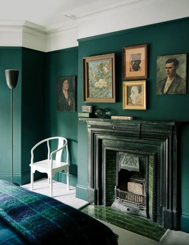 Moody Bedroom featuring Vintage Portrait Gallery and Dark Green Walls