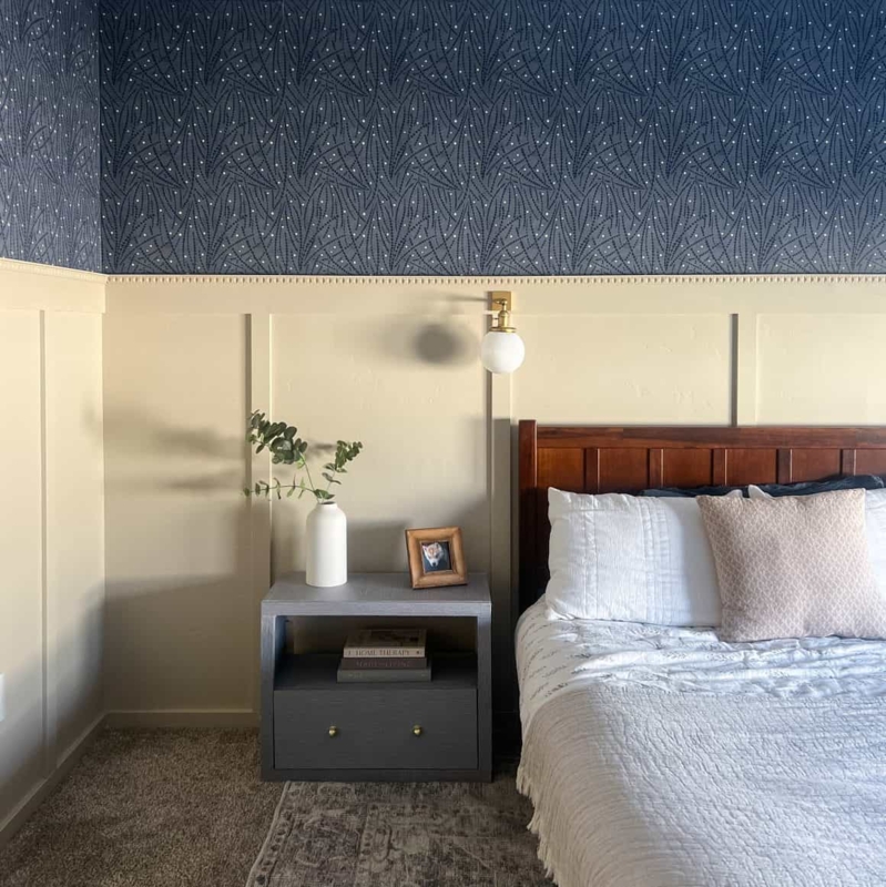 Moody Bedroom with High Board and Batten Wainscoting & Navy Wallpaper