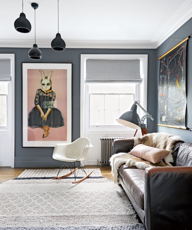 Moody Charcoal Living Room with White Rocking Chair and Leather Sofa