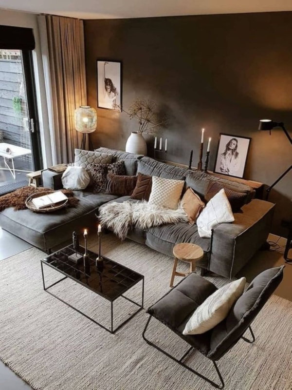 Moody Living Room with Sectional, Dark Walls, and Tiled Coffee Table