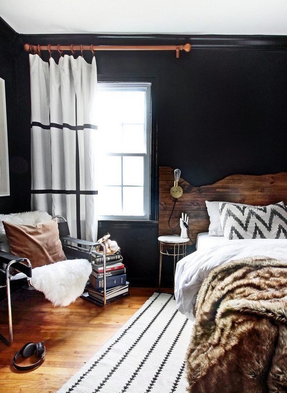 Moody Small Bedroom with Black Walls and Live Edge Headboard