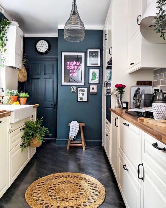 Moody Teal Kitchen Accent Wall with Eclectic Gallery and Jute Rug
