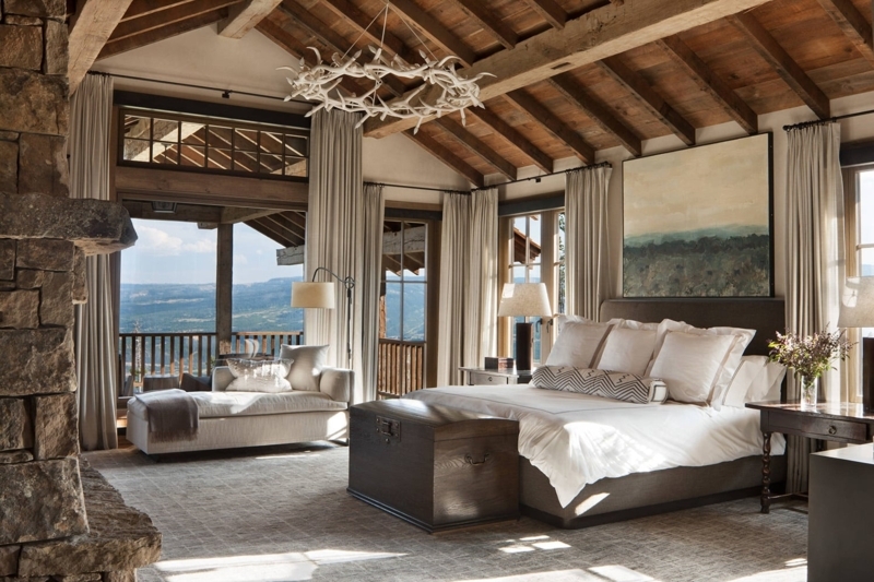 Mountain Lodge Bedroom: Antler Chandelier and Vaulted Ceiling with Views