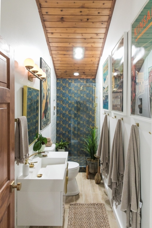 Narrow Bathroom with Wood Plank Ceiling and Geometric Blue Tile