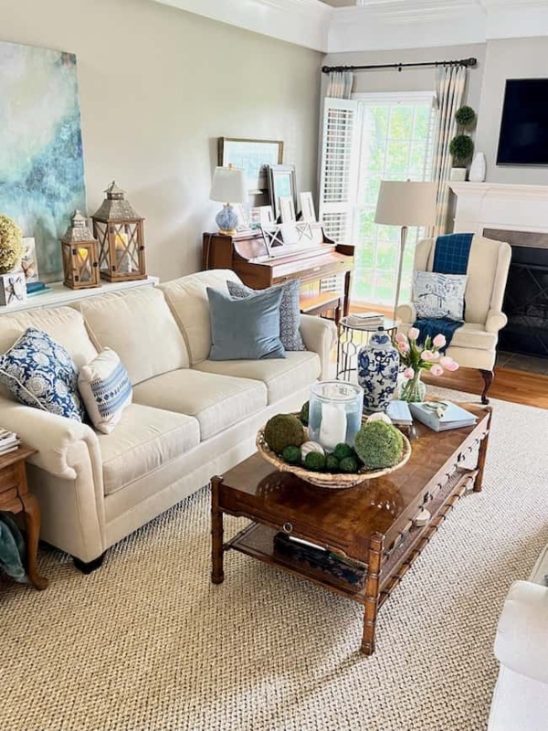 Natural Jute Area Rug in a Coastal Blue and White Living Room.