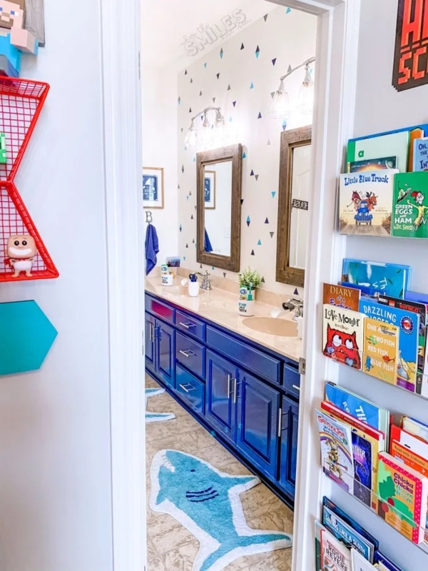 Nautical Kids Bathroom with Shark Shaped Rugs and Triangle Wall Decals