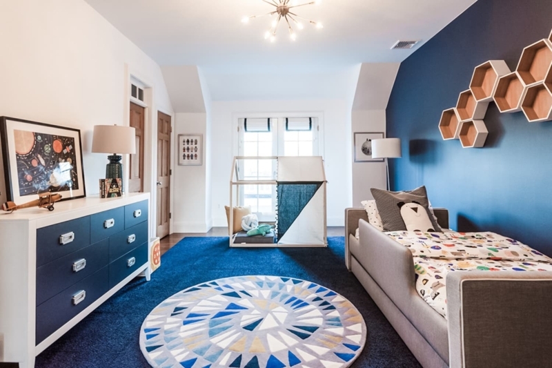 Navy Accent Wall with Hexagonal Honeycomb Wall Shelves & Rug