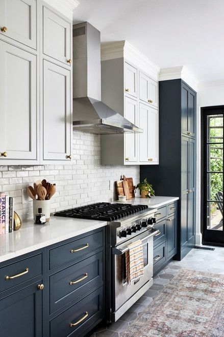 Navy and White Kitchen with Hexagonal Floor Tiles and Gold Hardware.