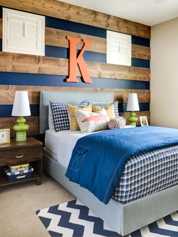 Navy and Wood Plank Accent Wall behind Upholstered Bed